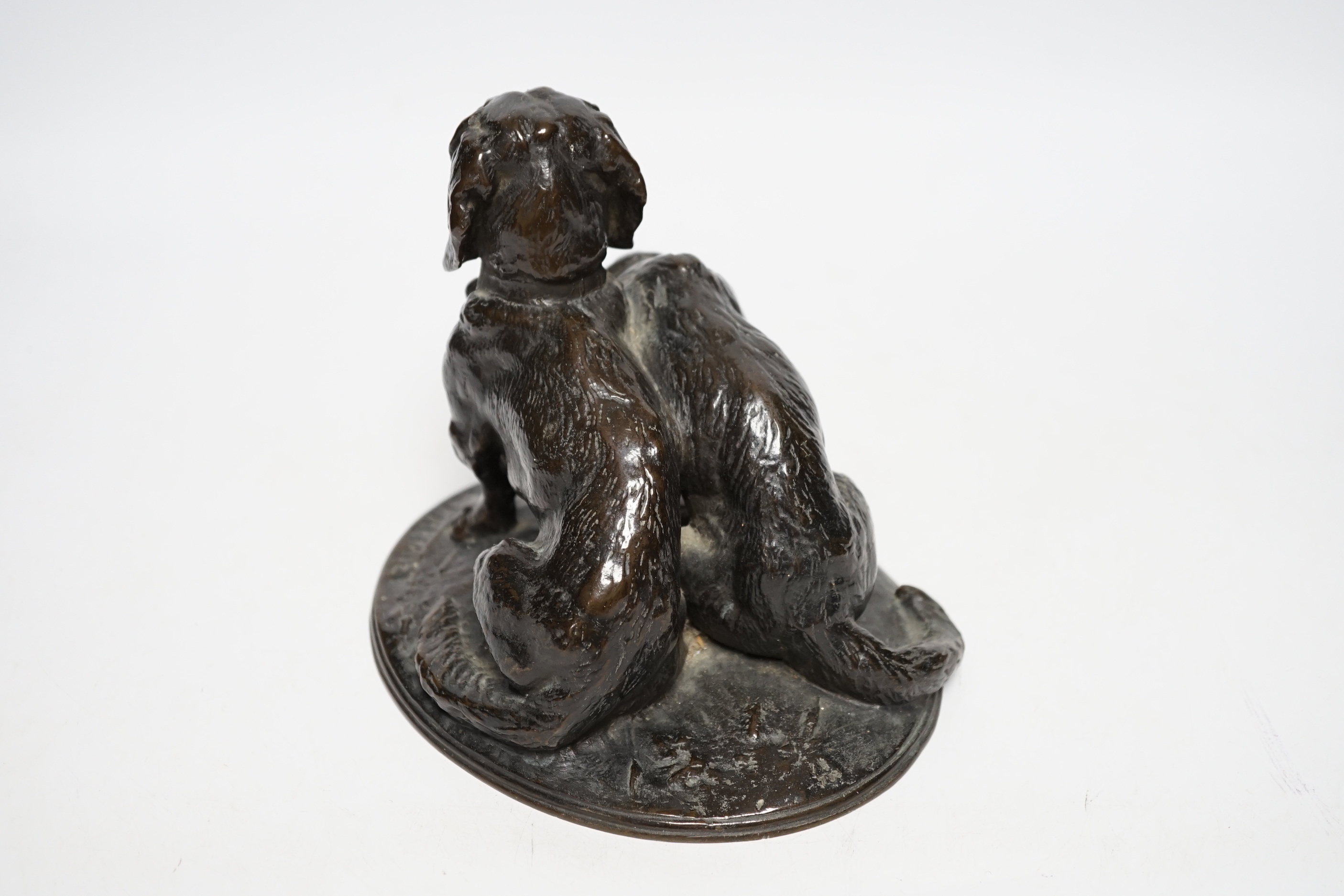 After Emmanuel Fremiet (1824-1910), a bronze group of spaniels, 14cm